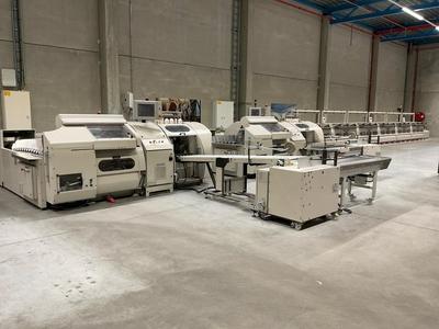 Overview picture of 2008 Meccanotecnica Multiplex Book finishing gathering (double)thread sewing line