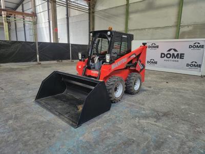 Immagine panoramica di 2024 Manitou 1900R - Minipala UE (mai utilizzata)