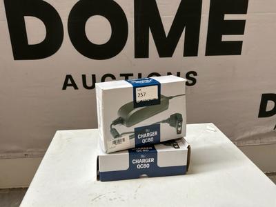 Immagine panoramica di Caricabatterie Husqvarna QC80 (mai utilizzato) (2 pezzi)