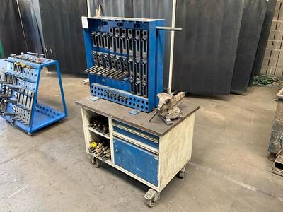 Overview picture of siegmund clamping equipmend and spare parts on trolley