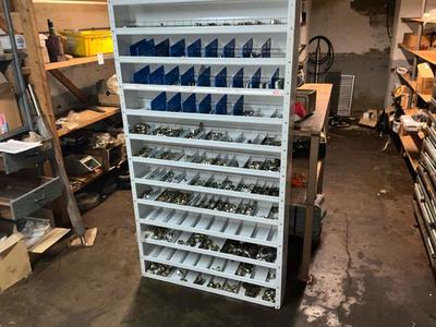 Overview picture of Metal pipe fittings, adapters and bolts